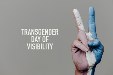 text transgender day of visibility and V-sign