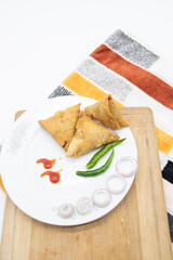 Samosa close up isolated on white background..