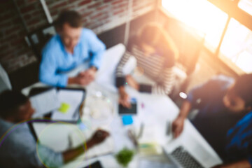 Obraz premium Business discussions. High angle shot of businesspeople having a meeting in an office.