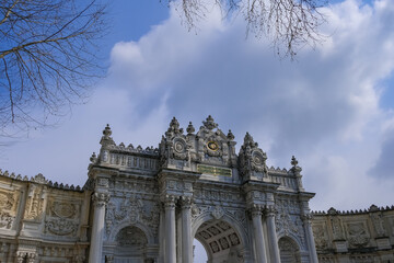 Fototapeta na wymiar Dolmabahçe Palace main entrance. famous touristic place in Istanbul, Turkey. travel card concept