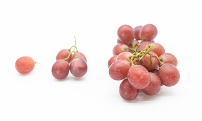 Bunch of red grapes isolated on background