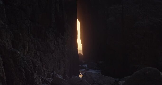 Zawn Pyg Natural Arch At Nanjizal Beach In Cornwall, England - static shot