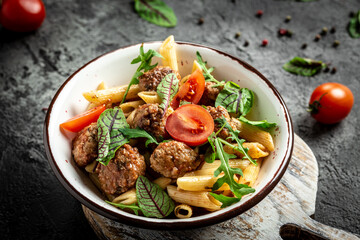 Meatball penne pasta with spicy tomato sauce. Restaurant menu, dieting, cookbook recipe banner, place for text, top view