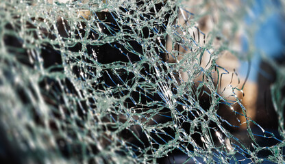 Car damaged by falling debris after Russian rocket attack