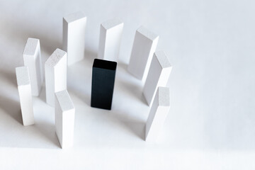 top view of rectangular black and white blocks on light background.