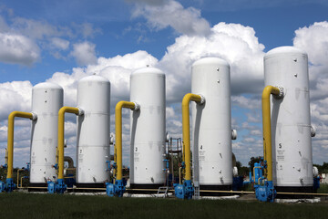 Gas transportation system. Booster pumping station for gas. Gas filling station and gas tanks. Transportation of gas around the world. Oil and gas sector. Gas turbines.