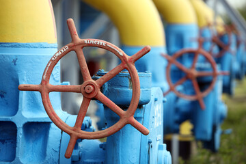 Gas transportation system. Booster pumping station for gas. Gas filling station and gas tanks. Transportation of gas around the world. Oil and gas sector. Gas turbines.
