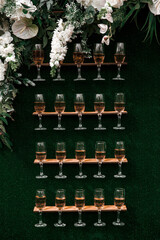 
glasses of champagne on the wall
decor with champagnе