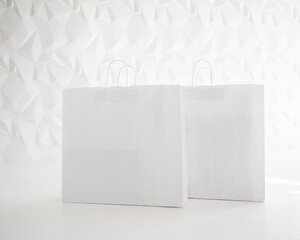 White paper bag isolated on white background