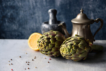 Still life with fresh artichoke flowers. Close up photo of beautiful natural pattern. Eating...