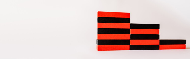 stairs made of red and black blocks on white background with copy space, banner.