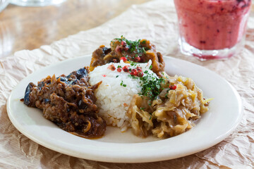 Rice served with chicken and traditional salads 