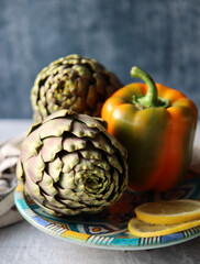 Still life with fresh organic artichokes. Eating healthy concept. Vegetarian meal p[reparation. Simple composition food still life. 