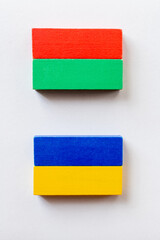 top view of rectangles made of colorful blocks on white background.