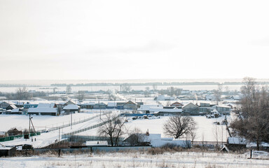 Fototapeta na wymiar panorama of the winter village in the snow