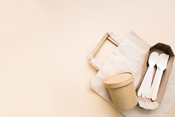 Top view of many wooden fork, spoon. Natural eco-friendly disposable utensils or creative idea design. Copy space.