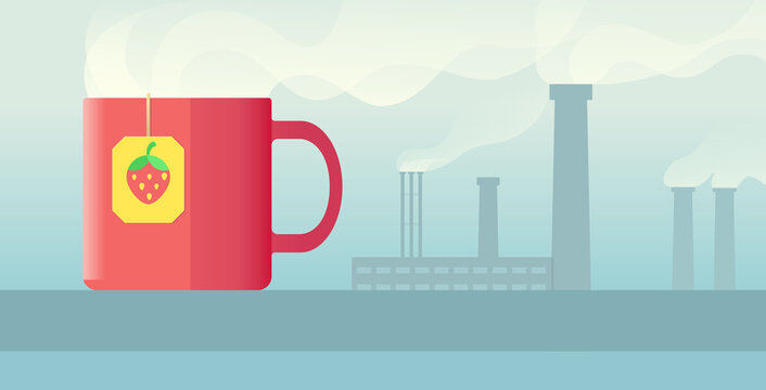 a mug with hot strawberry tea against the background of a factory of smoke and steam from pipes