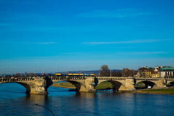 Fototapeta na wymiar Augustus Bridge in Dresden, blue sky, tourism, sightseeing