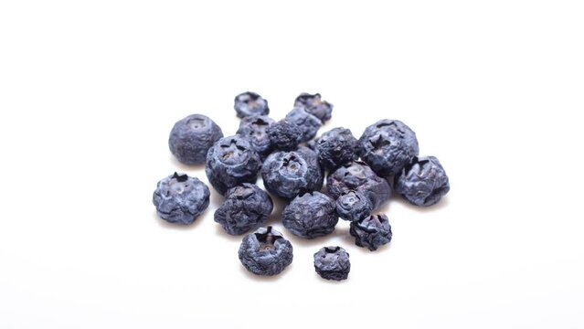 Blueberrys becomes dry and wrinkled. Berrys dehydrates quickly. Fast timelapse. Concept of aging, time, health, skincare, cosmetic care.