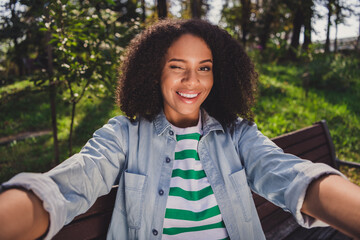 Self-portrait of attractive cheerful flirty girlish girl spending free spare time weekend winking...