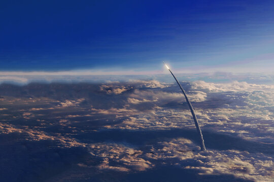 Rocket launch into space. Elements of this image furnished by NASA - Powered by Adobe