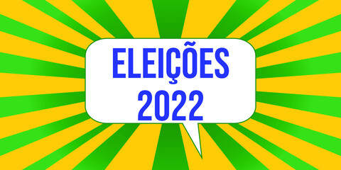 green and yellow panel with dialog box with text Elections 2022 in Portuguese. Translation: elections