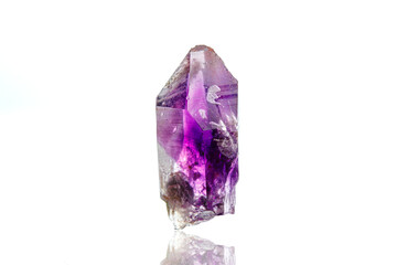 macro mineral stone amethyst on a white background