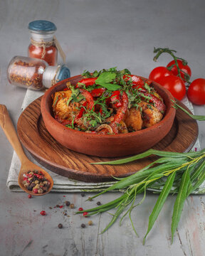 traditional georgian meat dish ojakhuri on gray background