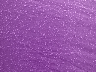 Water drops on waterproof membrane fabric. Morning dew on tent.