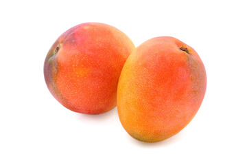 Two red - yellow mango isolated on white