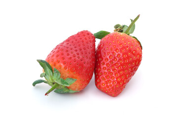 Two tasty strawberries isolated on white