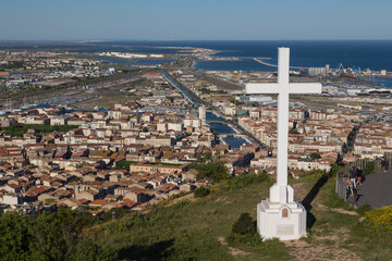 Panoramic view from the top of the mountain Mont St. Clair with its white cross over Sète’s...