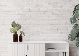 Empty, white brick wall. Mock up interior in contemporary style. Close up view. Free, copy space for your picture, text, or another design. Sideboard, monstera plants. 3D rendering.