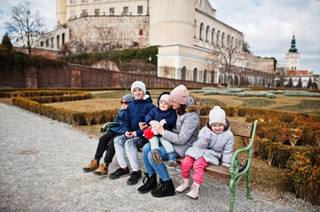 Obraz premium Family walking at historical Mikulov Castle, Moravia, Czech Republic. Old European town.