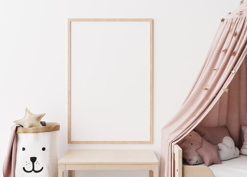 Empty vertical picture frame on white wall in modern child room. Mock up interior in scandinavian style. Free, copy space for your picture. Close up view. Cozy room for kids. 3D rendering.