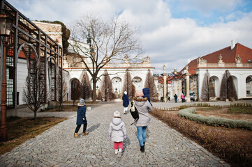 Fototapeta na wymiar Family walking at historical Mikulov Castle, Moravia, Czech Republic. Old European town.