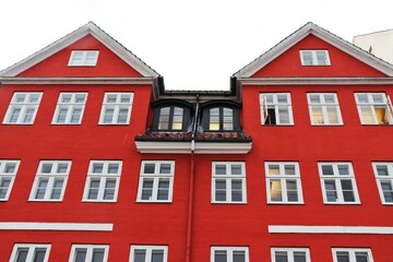 Fototapeta na wymiar Nyhavn district in Copenhagen, Denmark. City center panoramic view of colorful houses. High quality photo