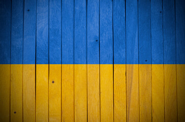 Wooden barns making Ukraine flag - message of peace.