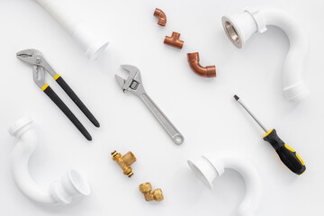 Plumbing pipes with tools for plumbing work, top view