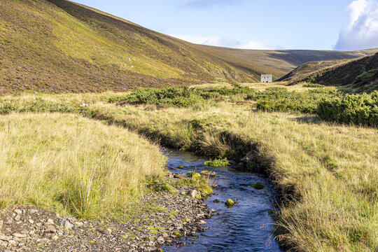Looking towards the old Lecht Mine in the valley of Conglass Water at Blairnamarrow near Tomintoul, Moray, Scotland UK.