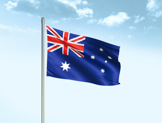 Australia national flag waving in blue sky with clouds. Australia flag. 3D illustration