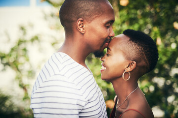 Obraz premium He makes me feel loved and cared for. Cropped shot of an affectionate couple standing outside.