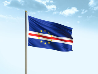 Cape Verde national flag waving in blue sky with clouds. Cape Verde flag. 3D illustration