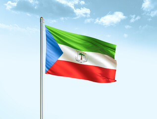 Equatorial Guinea national flag waving in blue sky with clouds. Equatorial Guinea flag. 3D illustration