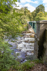 The River Dee flowing under the bridge near the entrance to Balmoral Castle, Aberdeenshire, Scotland UK