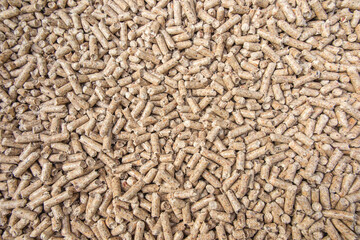 Wooden pellets used as fuel in ecological heating boilers.