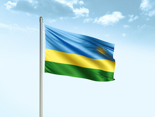 Rwanda national flag waving in blue sky with clouds. Rwanda flag. 3D illustration