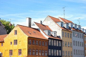 Fototapeta na wymiar Copenhagen Denmark colorful facades of old houses Christianshavn canal. High quality photo