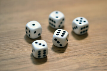 dice on wooden table 