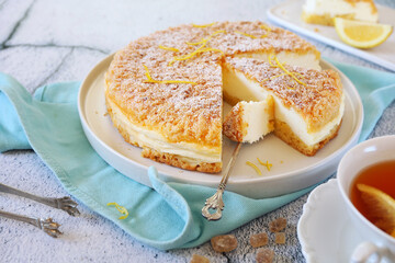 Italian cuisine. Ricotta (cottage cheese) grated tart and cup of tea